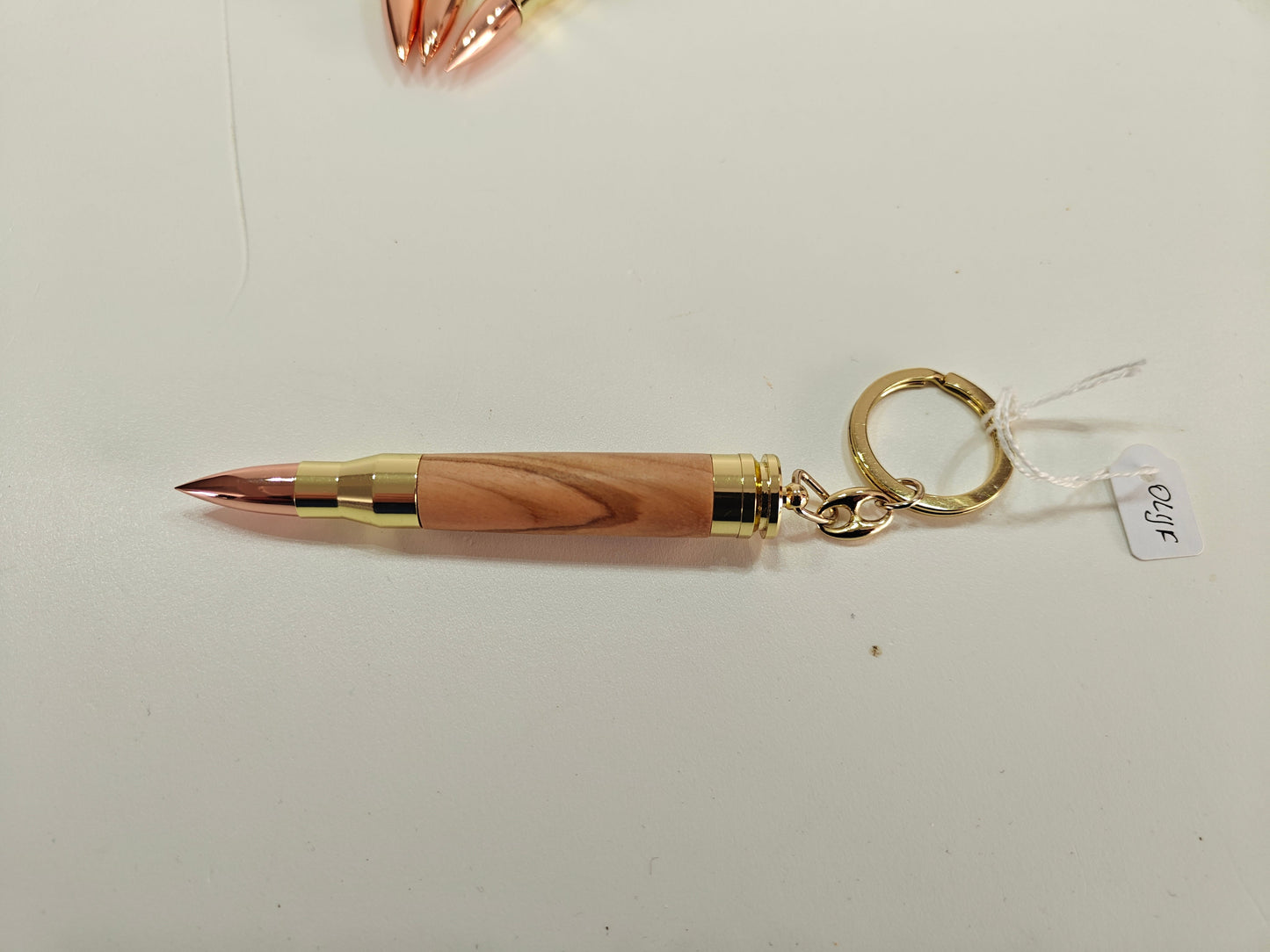 Bullet key chain uit verschillende houtsoorten, handgemaakt in België